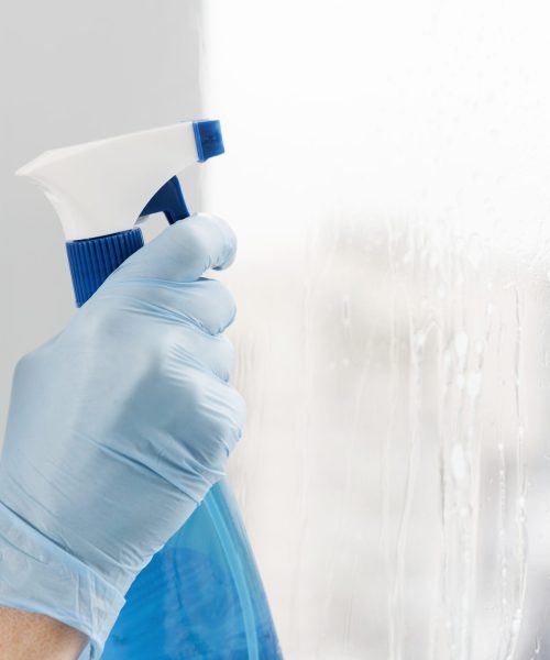woman-cleaning-window